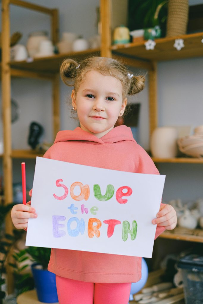 Photo by Anna Shvets: https://www.pexels.com/photo/a-little-girl-holding-a-save-the-earth-placard-11286181/